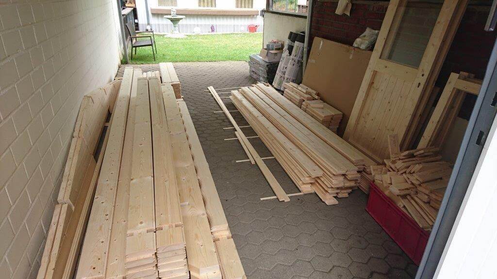 Holzgartenhaus montieren Bausatz sortieren